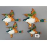 A set of four Beswick graduated flying duck wall ornaments (No’s 596).