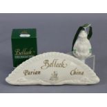 A Belleek porcelain fan-shaped advertising sign inscribed in gilt: “Belleek Parian China”, 8¾”