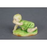 A Royal Worcester figure of a crawling infant, titled “Michael”, modelled by F.G. Doughty, model No.