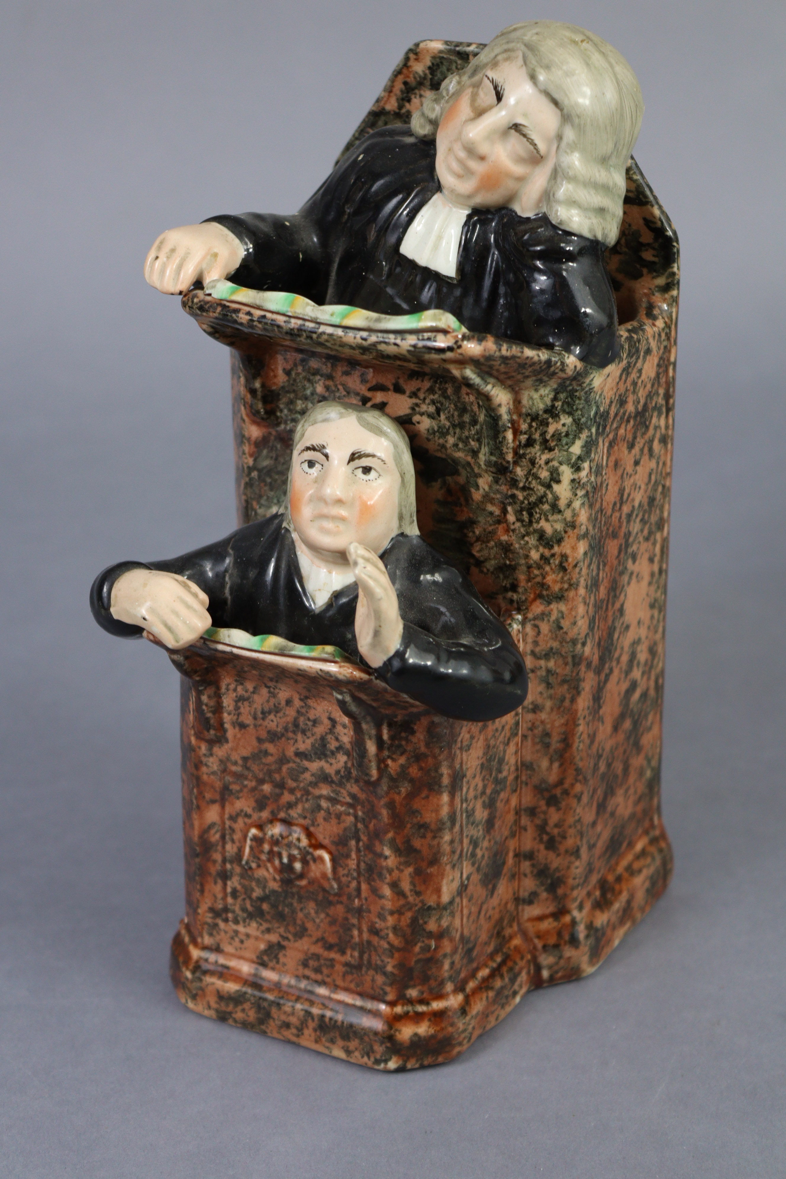 An early 19th century Staffordshire creamware group of “The Vicar & Moses”, the pulpit with