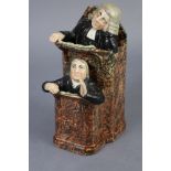 An early 19th century Staffordshire creamware group of “The Vicar & Moses”, the pulpit with
