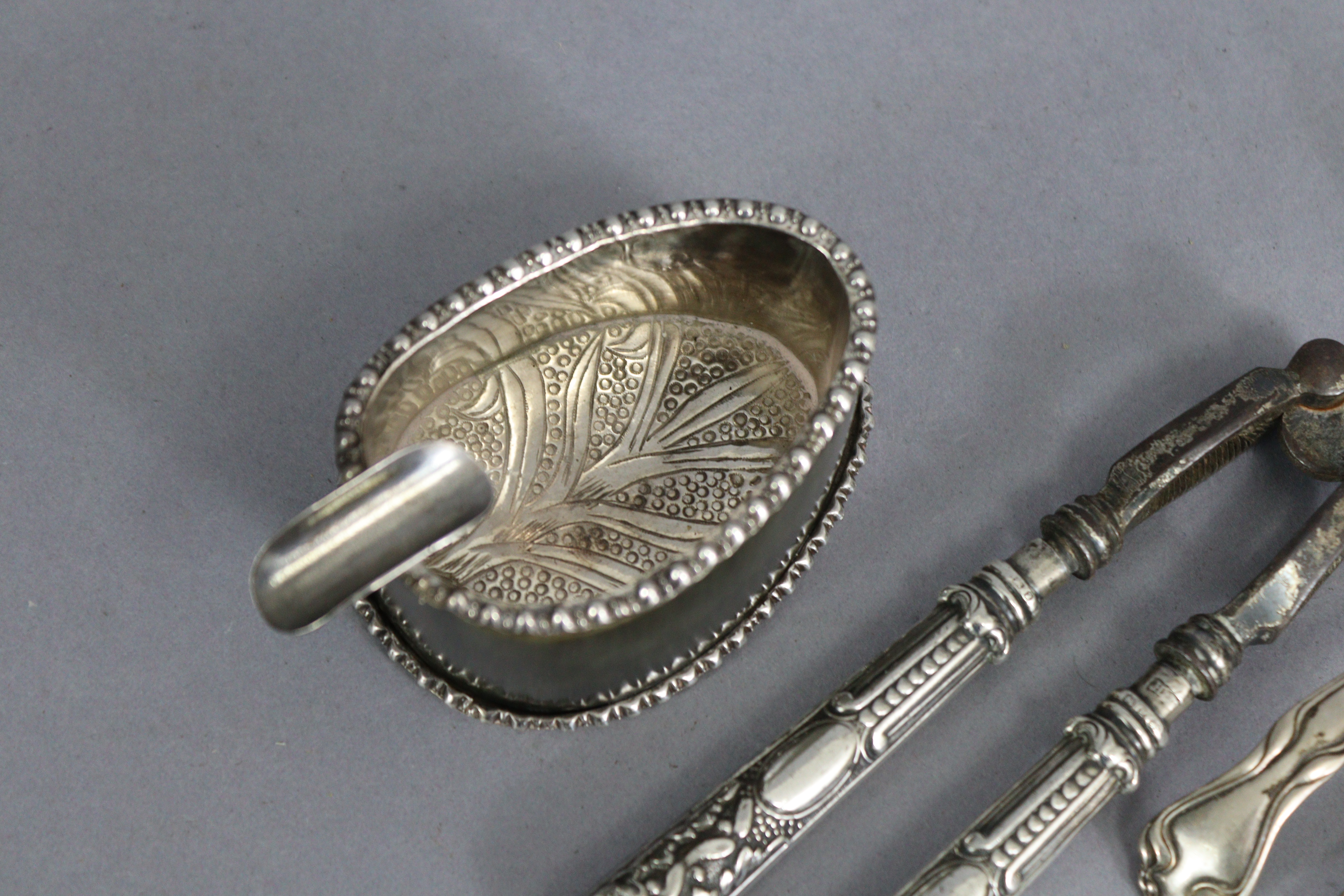 A pair of 18th century style silver scissor-action sugar nips, Birmingham 1977; a sugar-sifter - Image 2 of 4