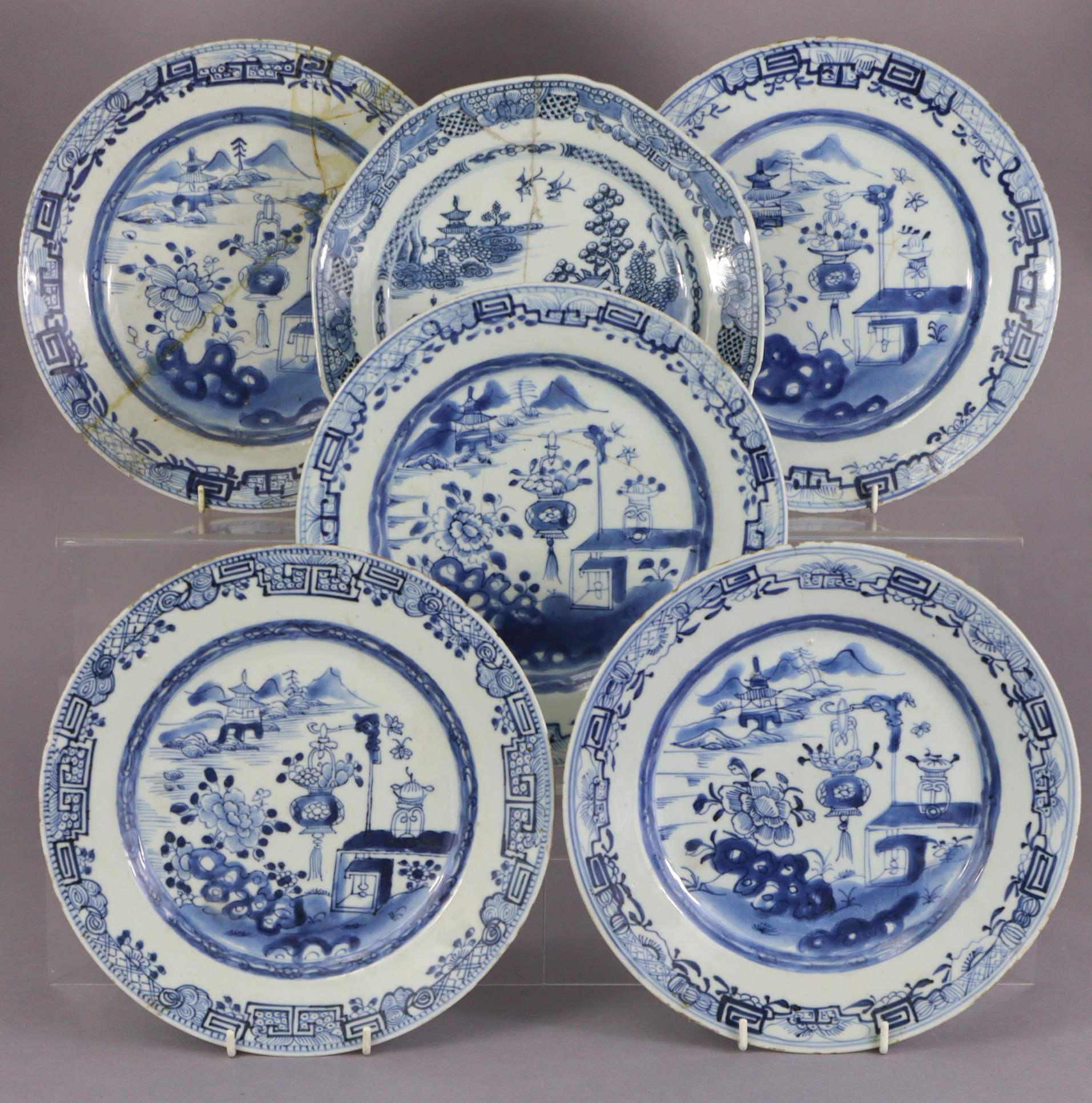 A set of five 18th century Chinese blue & white export porcelain 9½” plates, decorated with precious