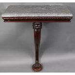 A William IV mahogany console table with moulded edge to the grey marble top, with carved leaf &