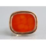 A large gold fob seal of open arch design, set cushion-shaped carnelian matrix (vacant), 1.10”