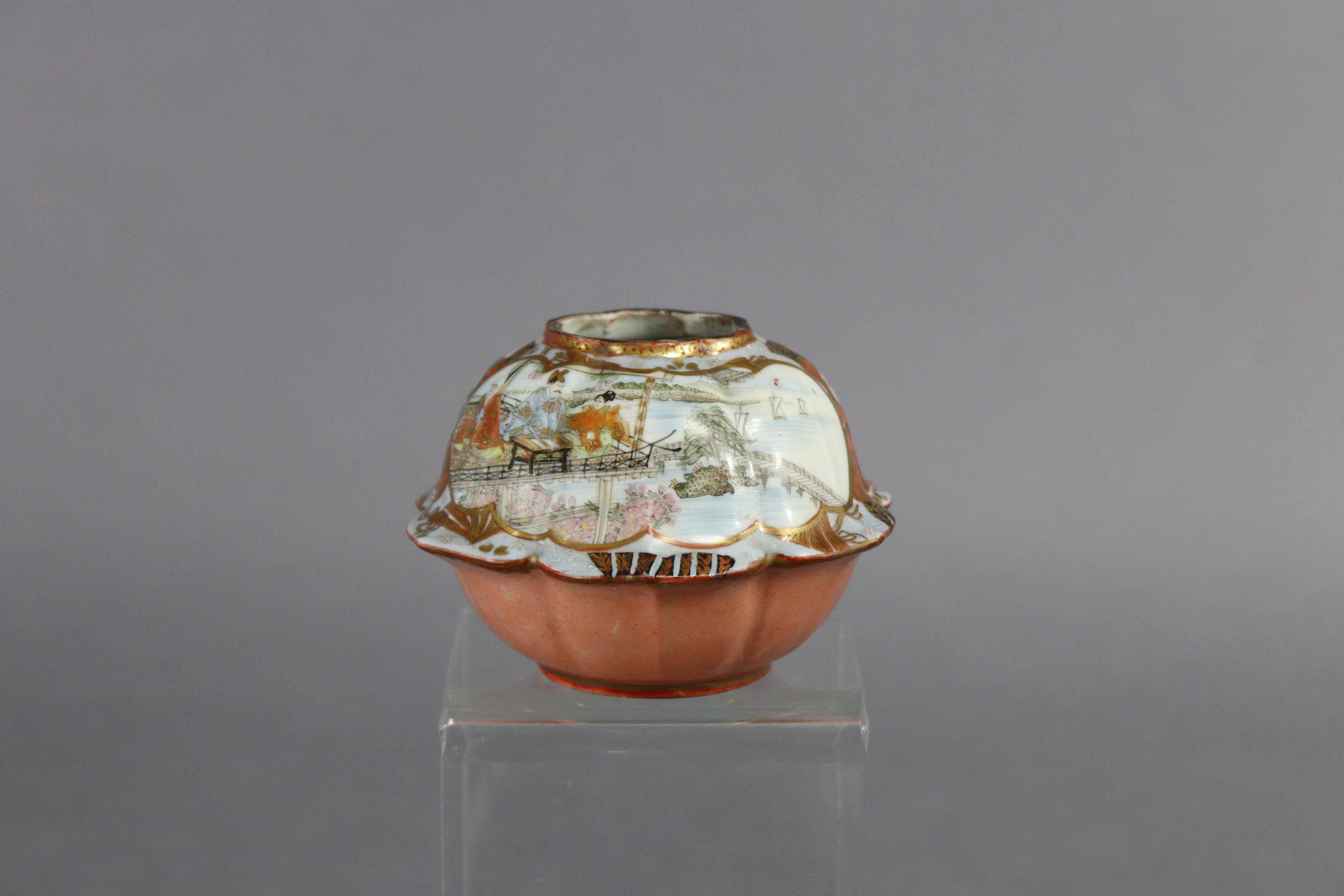 A 19th century Japanese porcelain shallow bowl of red ground decorated with flowers & landscapes in - Image 8 of 9