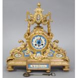 A 19th century French mantel clock in gold-painted ormolu case decorated with urn surmount, floral