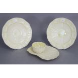 A pair of Belleek porcelain shell pattern 8” plates (2nd green mark); & a Tridacna pale yellow