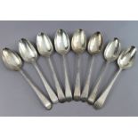 Eight George III silver Old English Bead pattern table spoons; London 1777 by Thos. Northcote, two