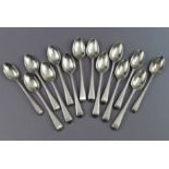 Twelve George III silver Old English Bead pattern teaspoons by George Smith III; & two slightly