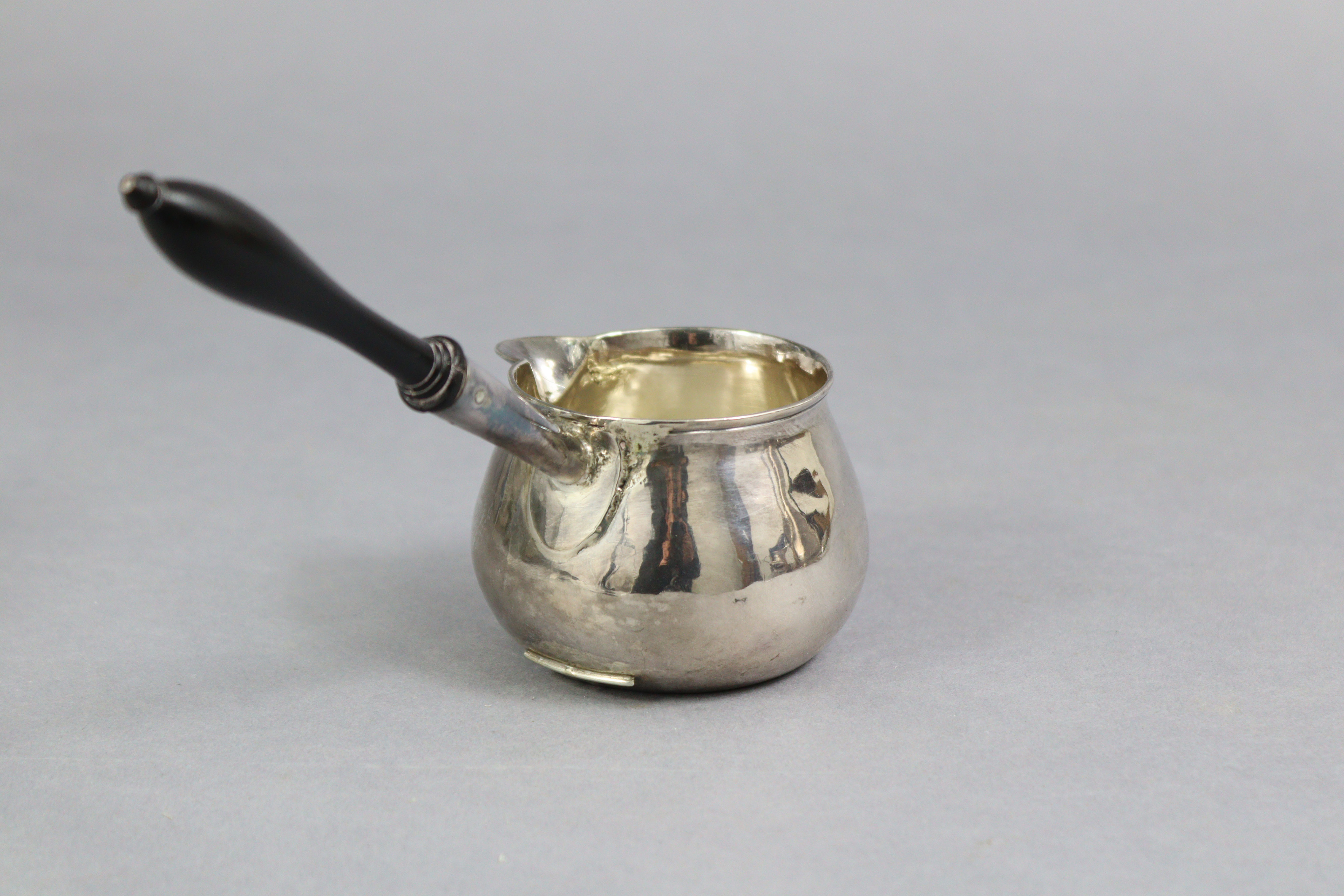 A George I silver brandy saucepan of baluster shape, with ebonised turned wood handle, 6¾” long; - Image 4 of 7