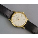 An Omega Automatic gent’ wristwatch, the circular silvered dial with gilt baton numerals, date