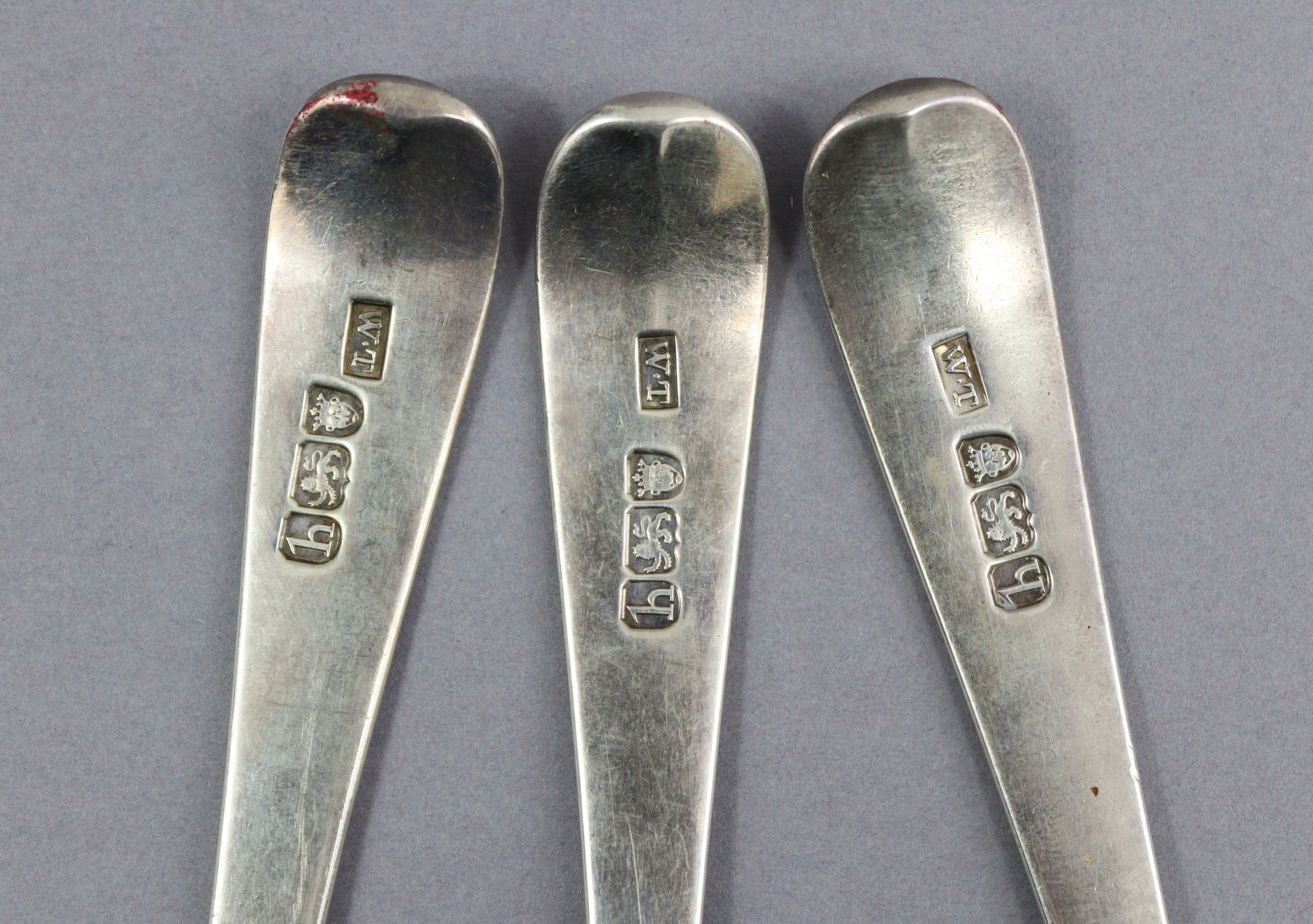 Eight George III silver Old English Bead pattern table spoons; London 1777 by Thos. Northcote, two - Image 3 of 7