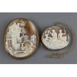 A late 19th/early 20th century carved shell oval cameo brooch depicting a classical figure scene, in