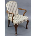 A Queen Anne style walnut armchair with padded seat & back upholstered striped silk floral damask.