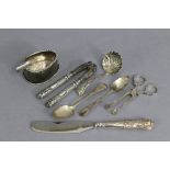 A pair of 18th century style silver scissor-action sugar nips, Birmingham 1977; a sugar-sifter