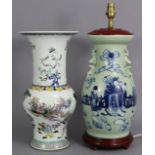 A Chinese porcelain baluster vase of celadon ground with underglaze blue figure scene decoration,