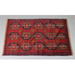 A Maimana kelim rug of ochre ground with repeating lozenge design within multiple geometric borders;