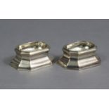 A PAIR OF GEORGE I SILVER TRENCHER SALT CELLARS of elongated octagonal form, each with oval