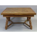 A French oak draw-leaf dining table with parquetry top, on turned baluster splay legs with centre