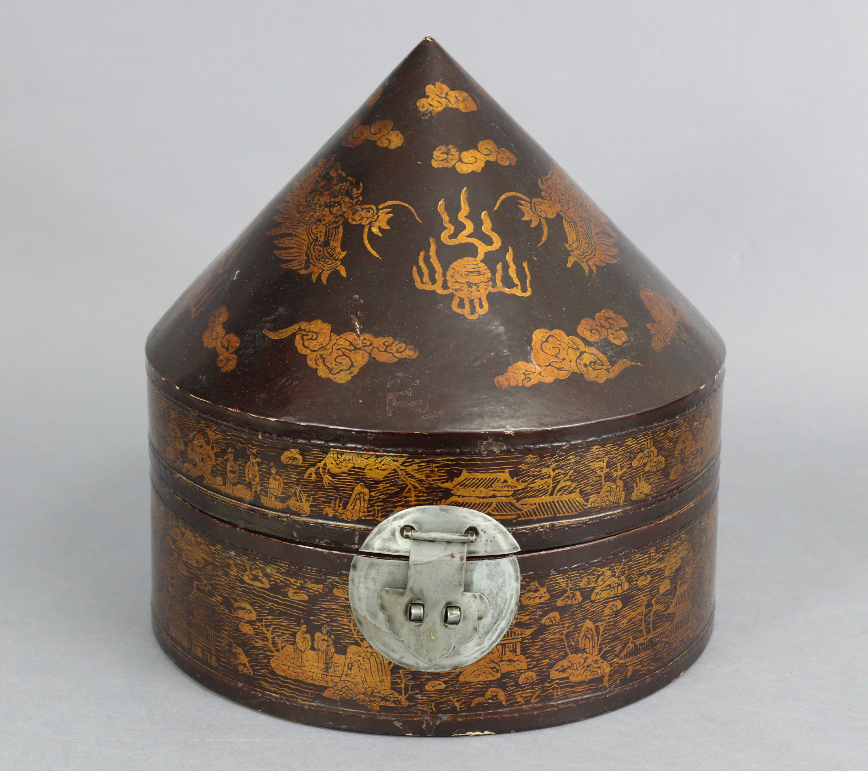 An early/mid 20th century Chinese black & gold lacquered hat box decorated with dragons chasing