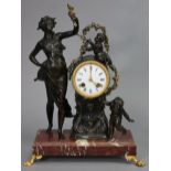 A 19th century French mantel figural clock in speltre rococo-style case flanked by a standing female