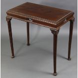 A mahogany occasional table in the mid-18th century style, with carved foliate edge to the rectangul