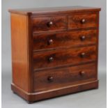 A good quality Victorian mahogany chest with rounded corners to the plain rectangular top, fitted