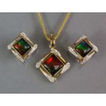 Am Ammolite lozenge-shaped pendant in 18K mount, on 14K chain necklet; & pair matching ear-