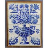 AN ANTIQUE PORTUGESE TILE PANEL comprising twelve 5½” tin-glazed tiles painted in blue with