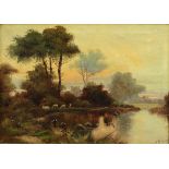 J. STANNARD (19th century). A wooded river landscape with sheep beside a path to the fore. Signed