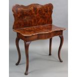 A late 18th/early 19th century French walnut & burr-walnut serpentine front tea table with