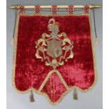 A 19th century continental needlework & metal-thread armorial banner; 54" wide x 54.25" high.