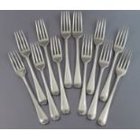 Twelve George III silver Old English Bead pattern table forks; London 1783, by George Smith III. (