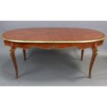 A LOUIS XV STYLE MAHOGANY DINING TABLE with rounded ends to the radially veneered & brass-edged