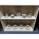 A Susie Cooper bone china “Venetia” pattern twenty-one-piece part coffee service.