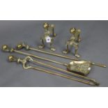 A pair of ornate cast brass fire-dogs with claw-&-ball terminals, 9½” high & a ditto set of three