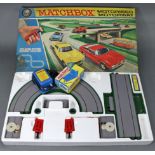 A Matchbox “Motorised Motorway” set (M-2, lacking cars), boxed.