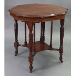 A Victorian mahogany occasional table with moulded edge to the octagonal shaped top, & on four