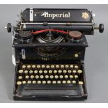 An early/mid-20th century Imperial typewriter.