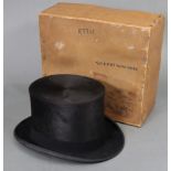 A 1930’s black silk top hat by Lincoln Bennett & Co of Old Bond Street, London (size 7½), with
