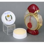 A Cartier of Paris frosted glass & crimson plastic & gilt-metal scent bottle of circular form,