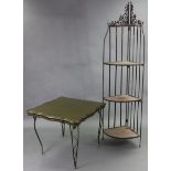 A black painted wrought-metal & woven-cane four-tier fold-away corner whatnot, 72” high; & a