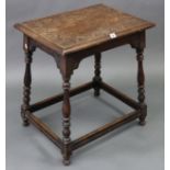 A late 19th/early 20th century oak occasional table with carved decoration to the rectangular top, &