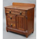An oak & walnut small side cabinet, fitted frieze drawer above two small drawers & a cupboard