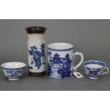 An 18th century Chinese blue & white porcelain tankard with landscape decoration & dragon handle, 5”