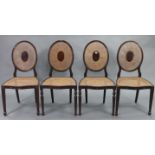 Two pairs of continental-style mahogany occasional chairs, each inset woven-cane panel to the seat &