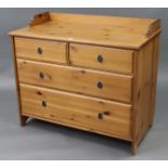 A pine low tray-top chest fitted two short & two long graduated drawers, 37¼” wide x 32½” high.