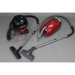 A Numatic “Henry” cylinder vacuum cleaner, & a Miele “58 Cat & Dog” ditto, both w.o.