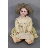 A Simon & Halbig large bisque-head girl doll (18/19 S & H), with brown sleeping eyes, open